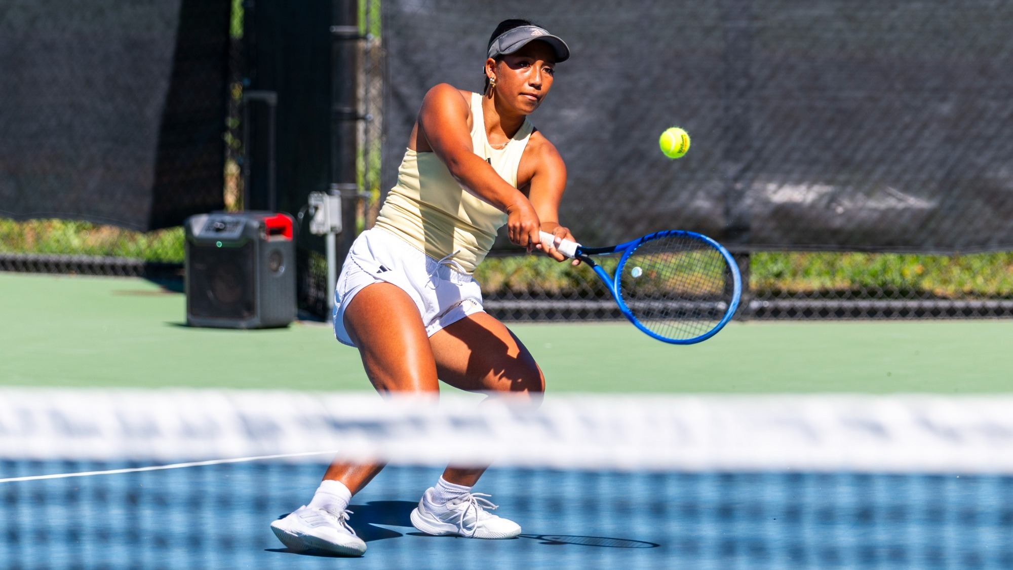 Lorenza Foster-Simbulan returns a ball against Chaminade