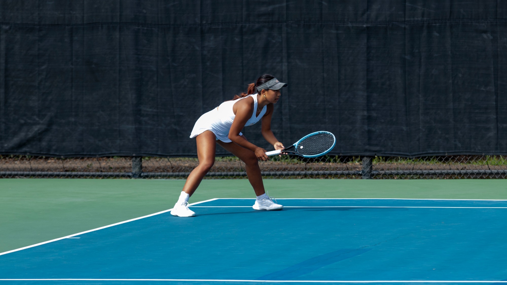 Lorenz Foster-Simbulan awaits a serve