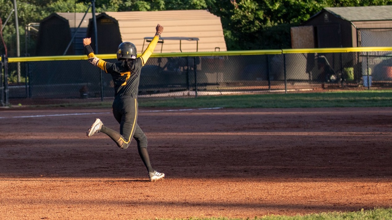 Karlyne Manuel celebrates her first career home run against APU