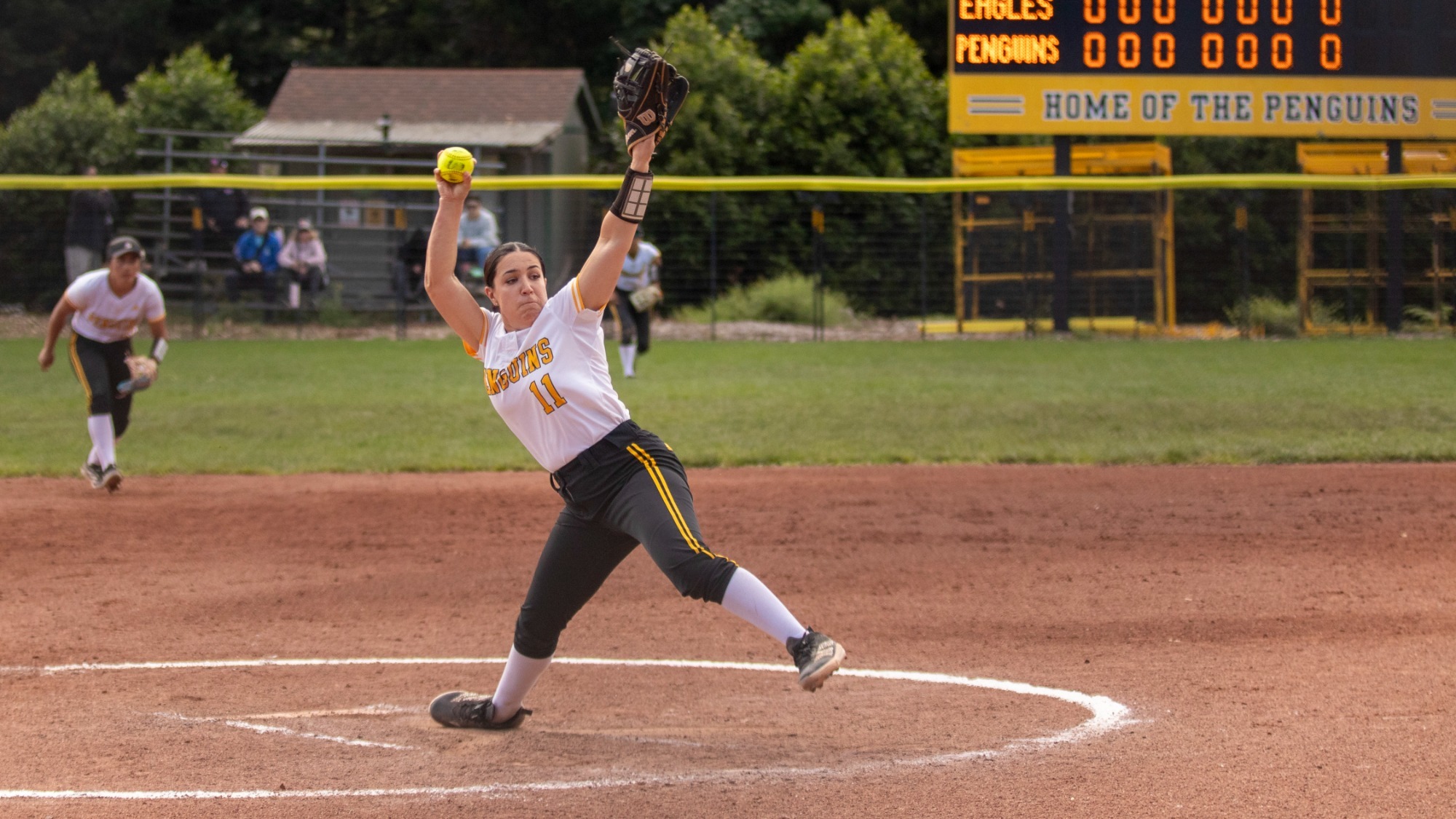 Taylor Rodriguez throws a pitch against Biola