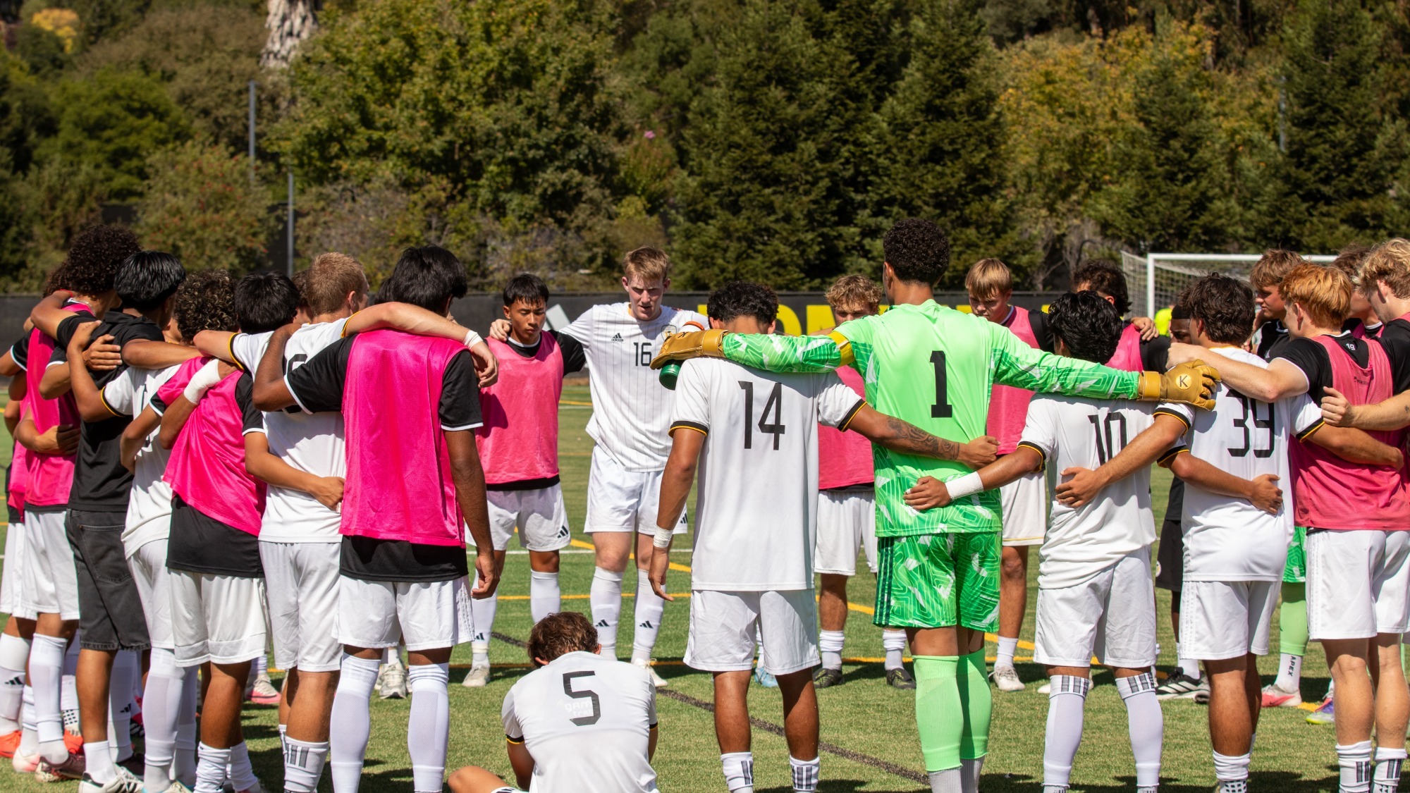 Dominican huddles prior to its home opener with Chico State