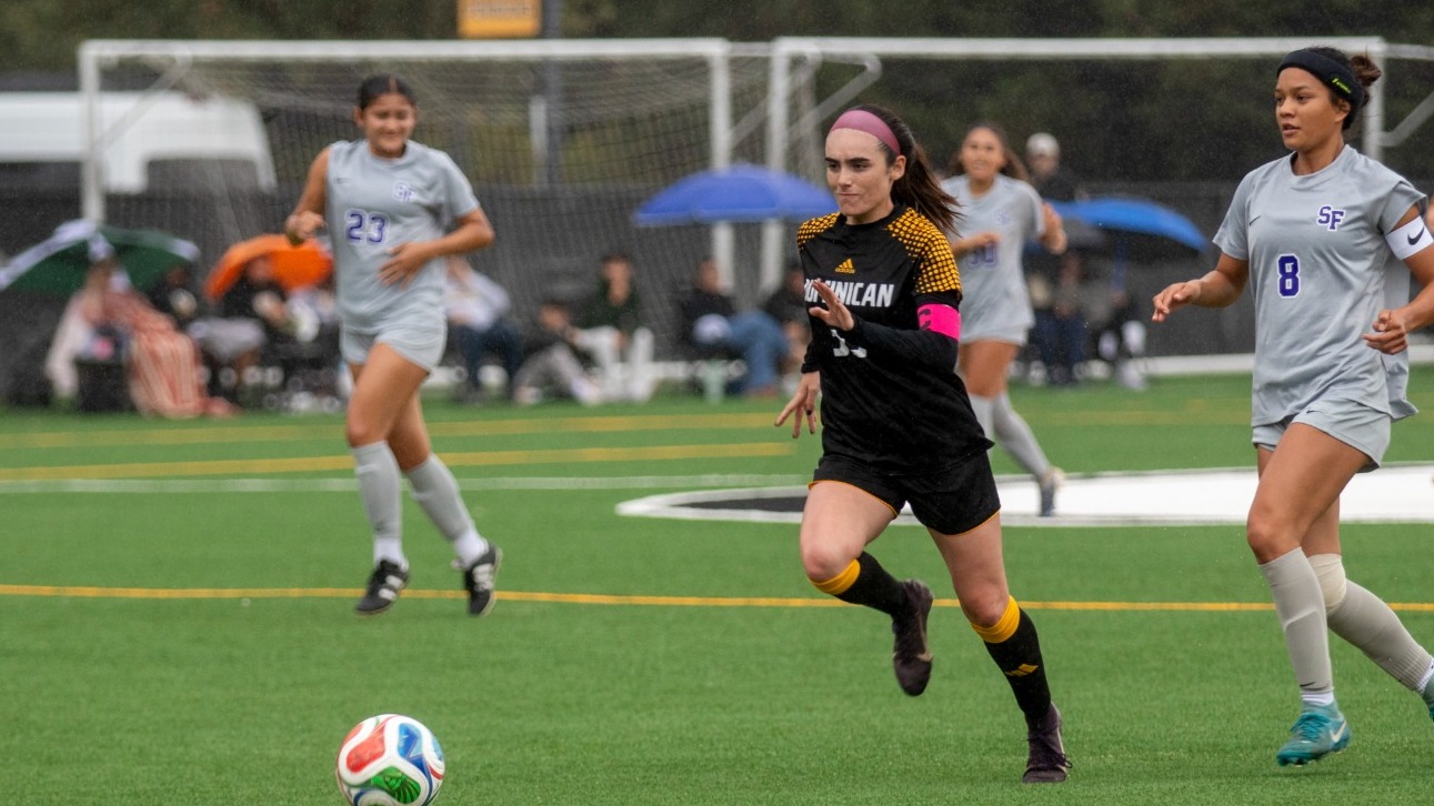 Carson Warfield pushes the ball upfield against San Francisco State