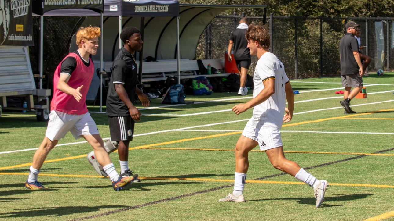 Jake Kazlauskas and Nathan Freitas share a moment against Chico State