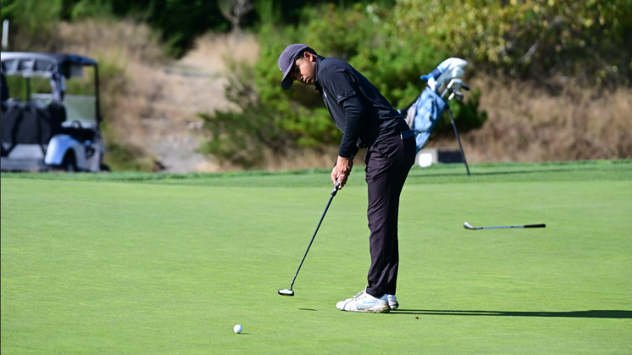 Miki Khursheed watches a put in the second round of the SMU Bishop Invitational