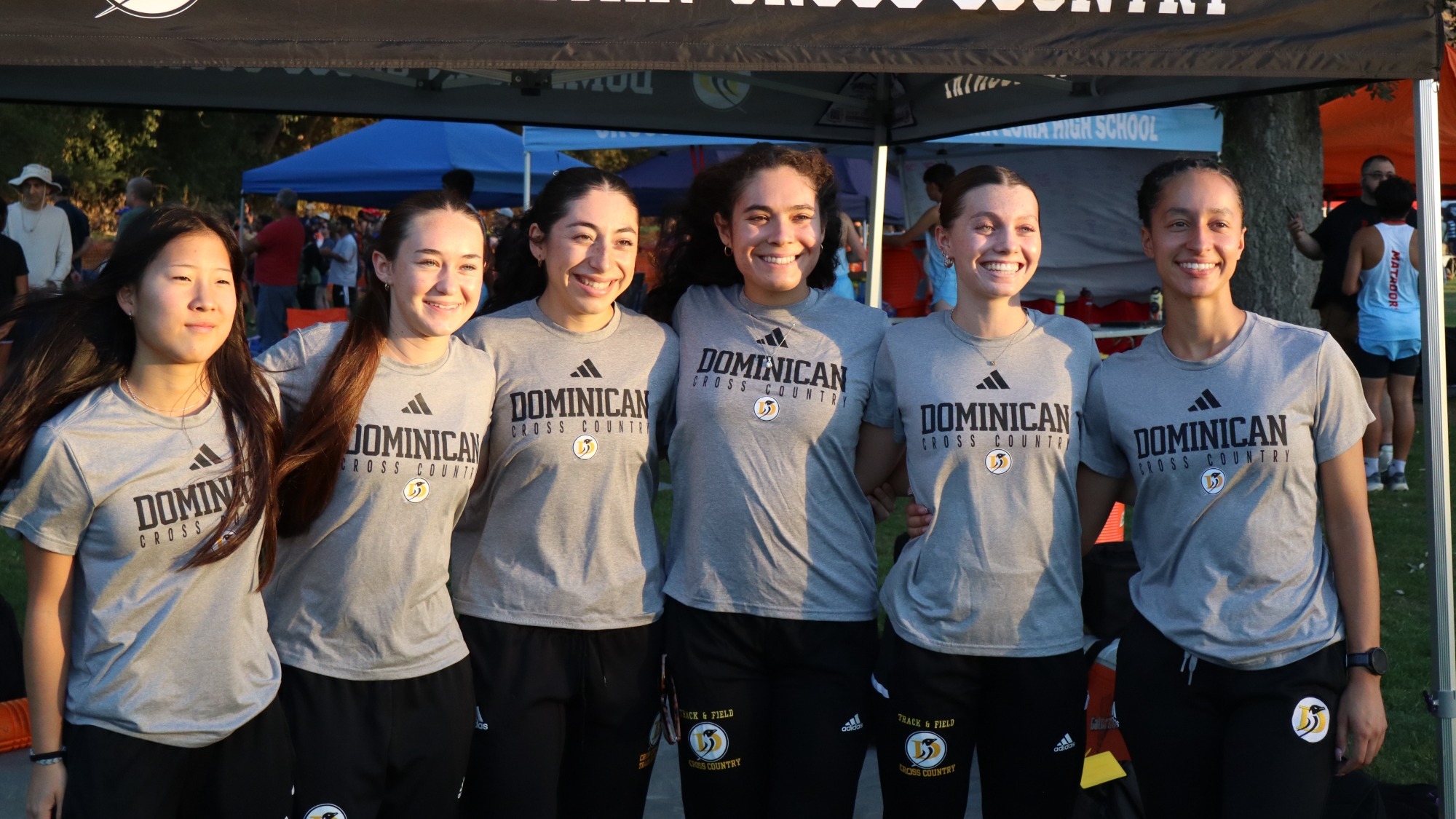 Dominican's women's cross country team poses before a race