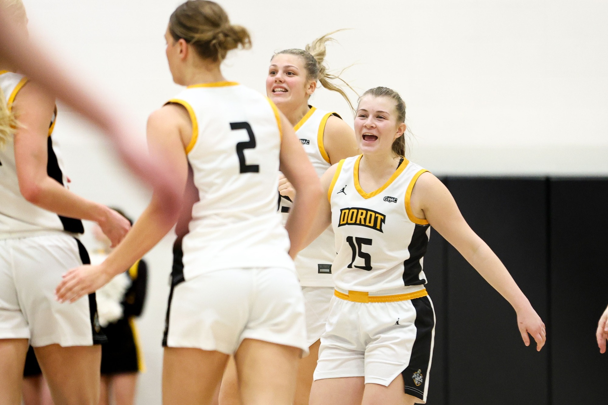 Women's Basketball celebrate