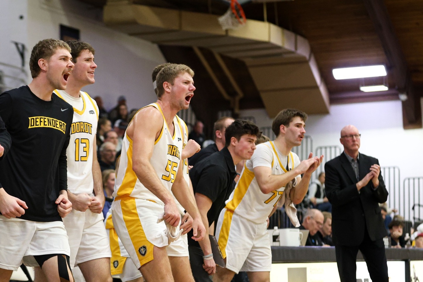 Men's Basketball celebrate