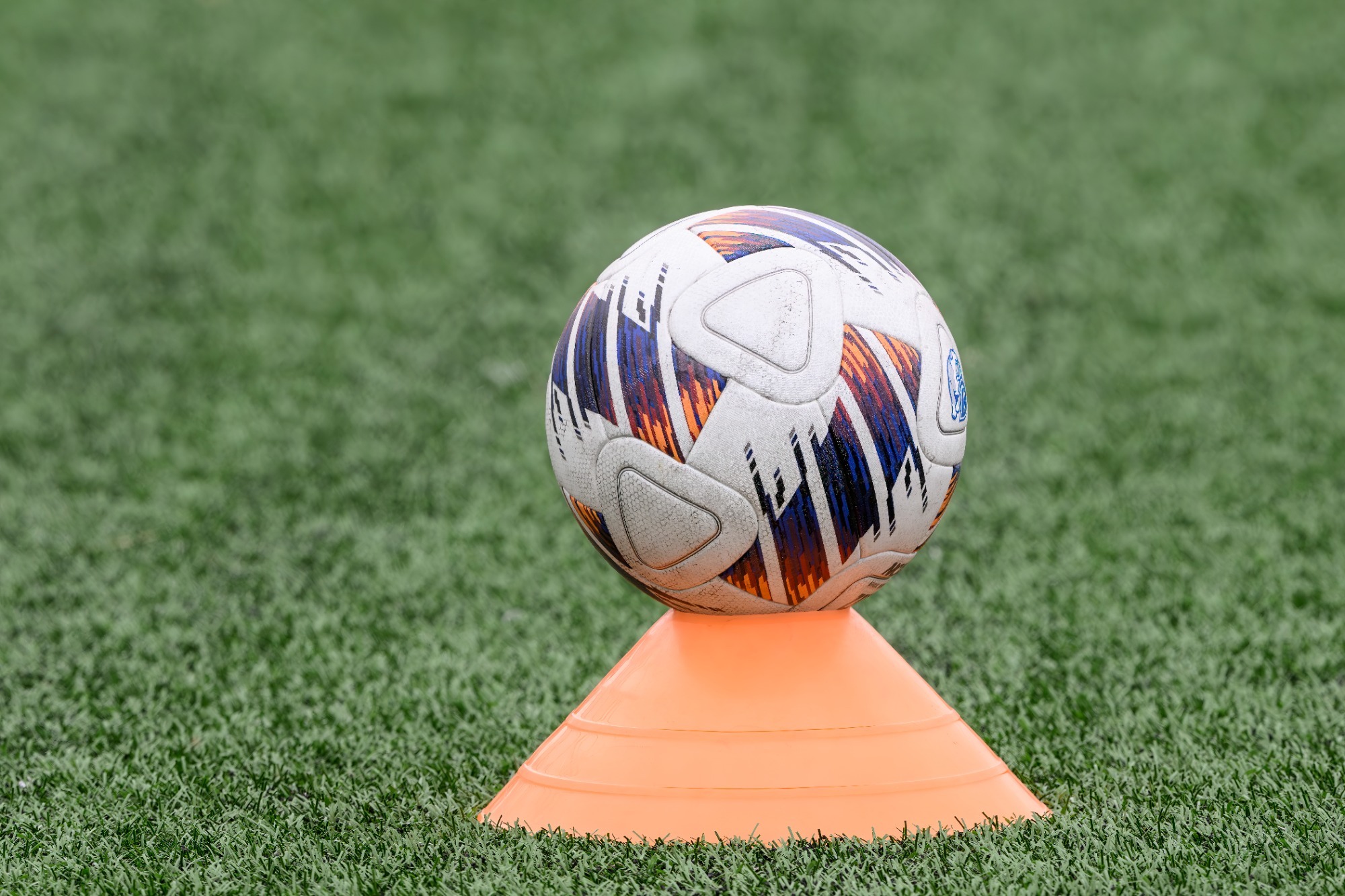 soccer ball on cone