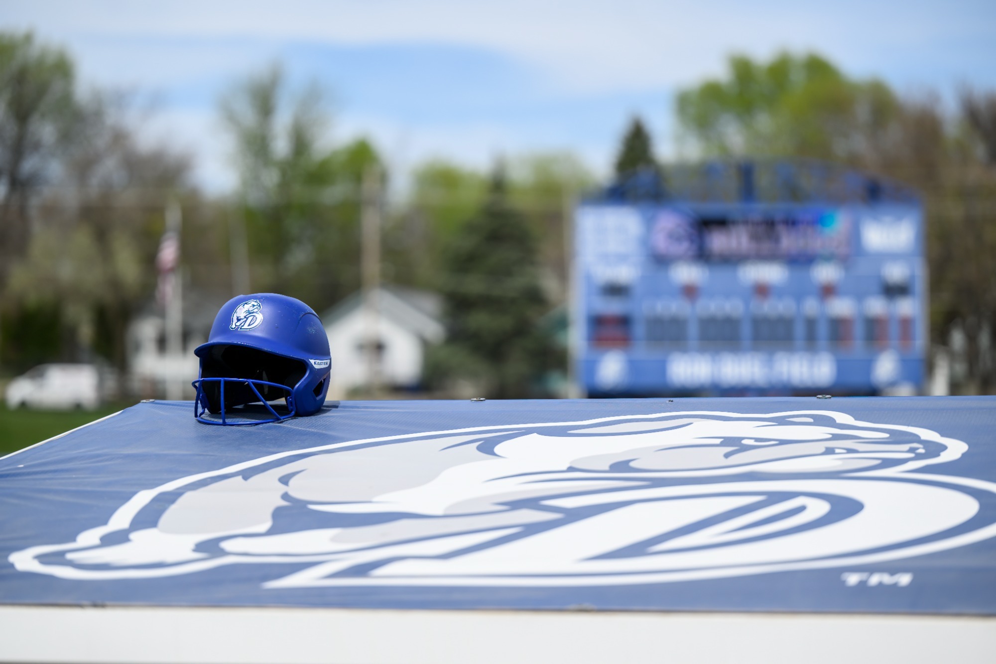softball helmet on dugout