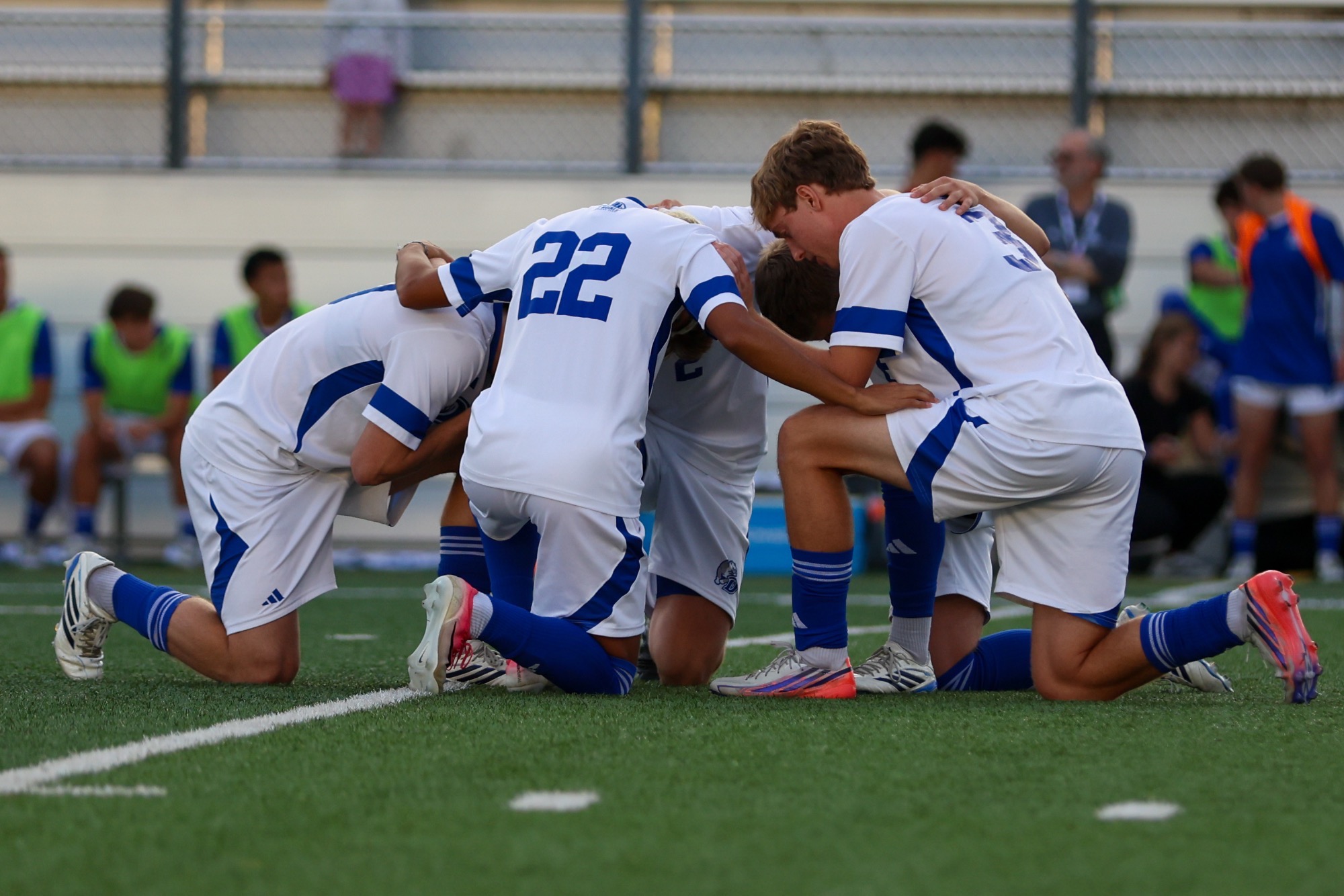 MSOC kneel huddle