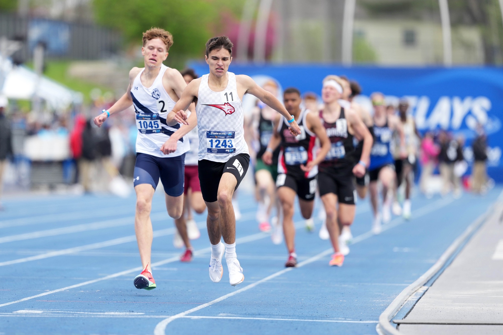 Apr 25, 2025; Des Moines, IA, USA; Quentin Nauman ofEpworth Western Dubuque defeats Caleb Ten PasDes Moines Christian to win the 800m in 1:51.76 during the 115th Drake Relays at Drake Stadium. Mandatory Credit: Kirby Lee-Imagn Images