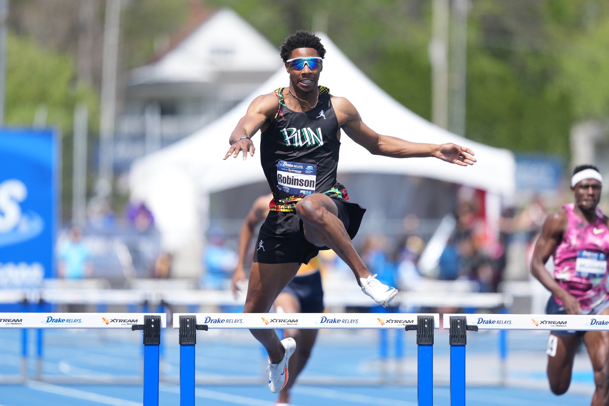 Apr 26, 2025; Des Moines, IA, USA; Christopher Robinson wins the 400m hurdles in 48.92 during the 115th Drake Relays at Drake Stadium. Mandatory Credit: Kirby Lee-Imagn Images