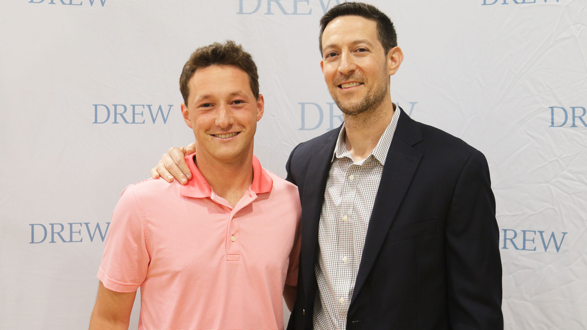 Men's Tennis MVP Jesse Faro (left) and Associate Director of Athletics Brian Hirschberg