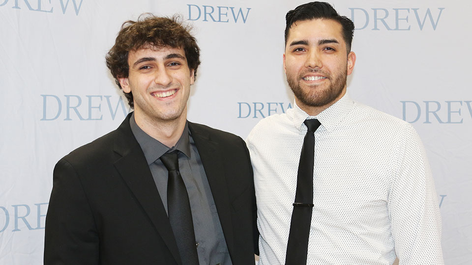 Men's Volleyball MVP Ephraim Smith C'25 (left) and Head Coach Julian Diaz