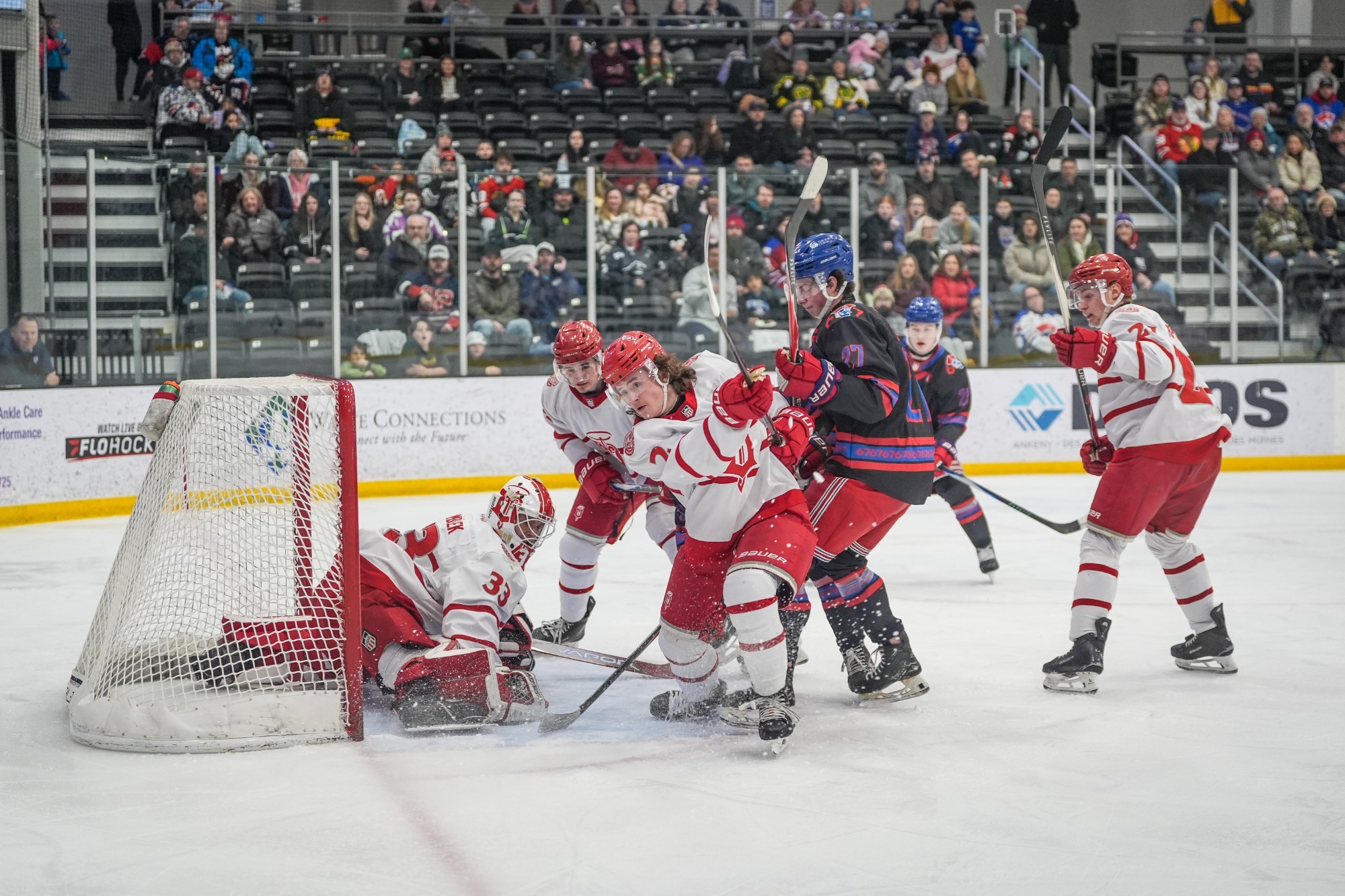 Teo Besnier clears puck against Des Moines on Jan. 17