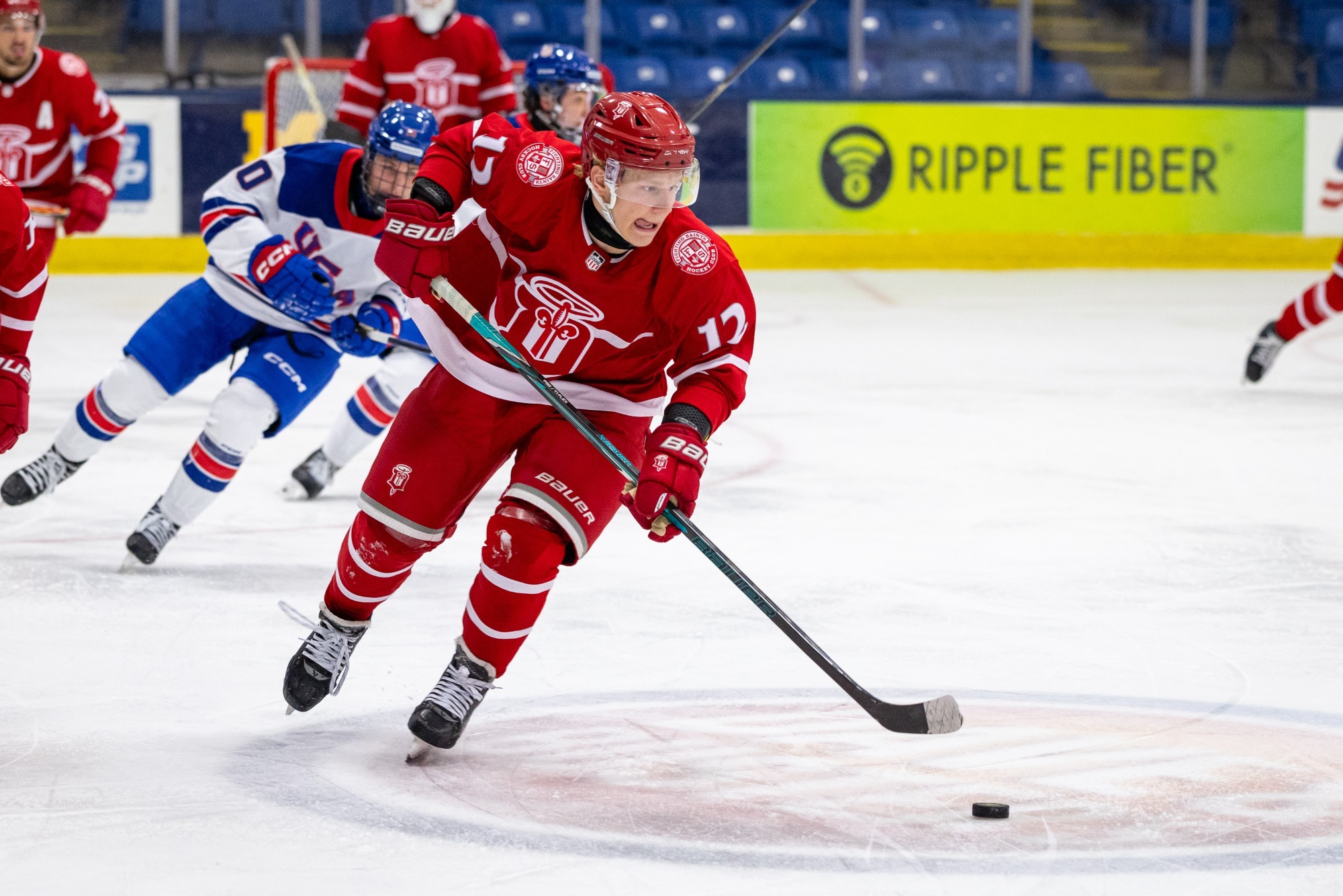 David Blasiak carries puck vs USA U18 on Oct. 17