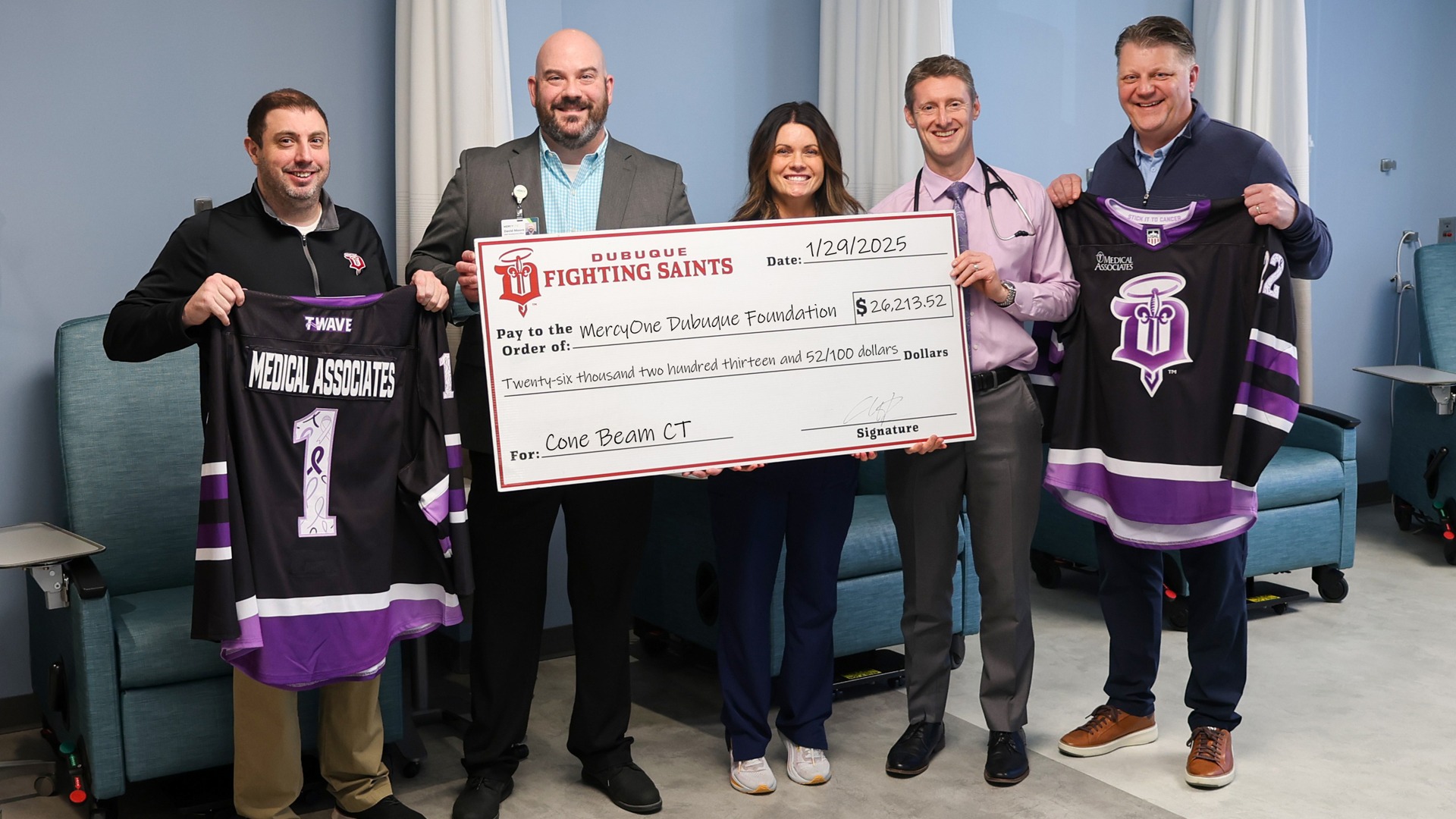 Check presentation from Saints to MercyOne Cancer Center 