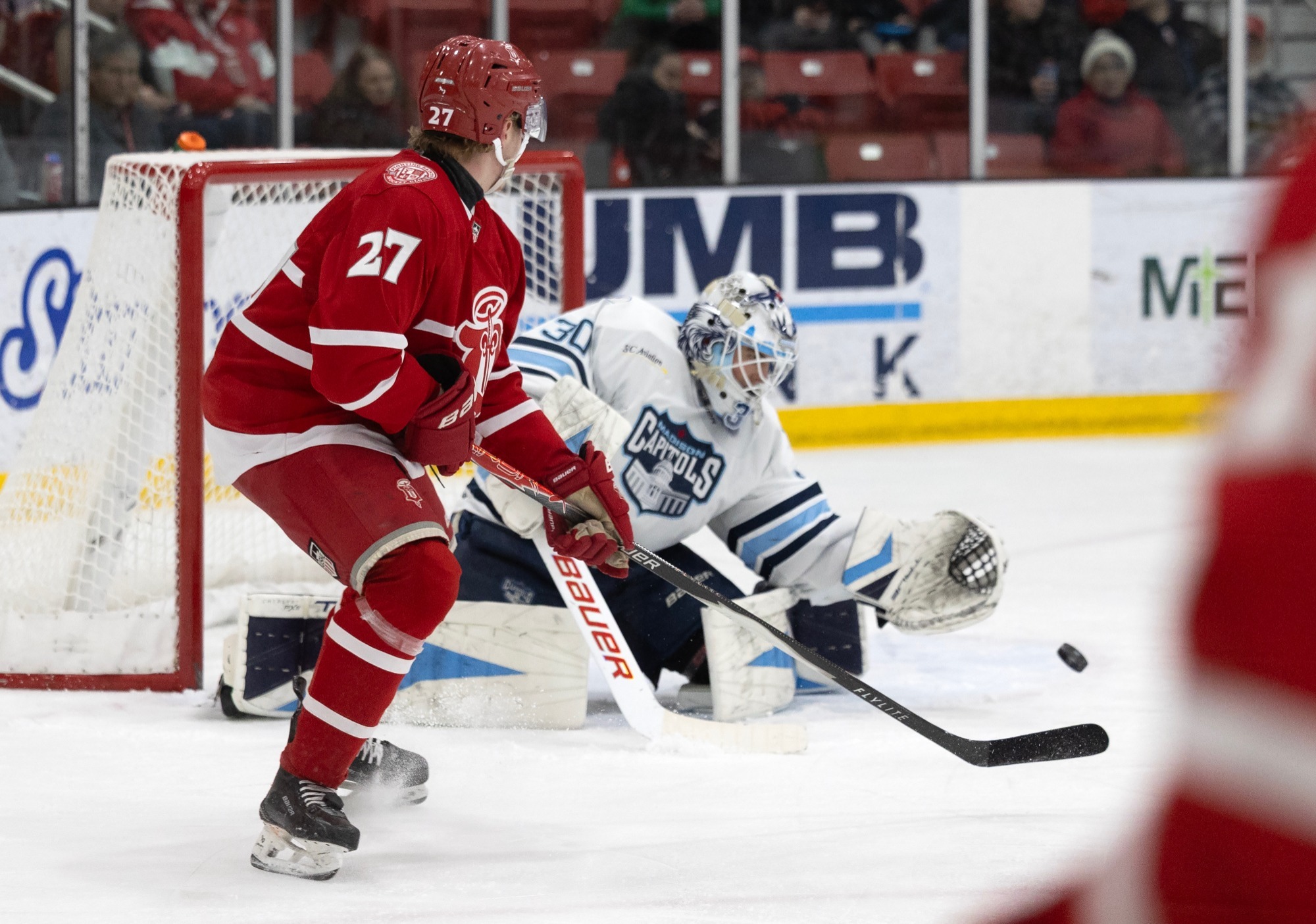 Eetu Orpana shoots puck against Madison on Feb. 5