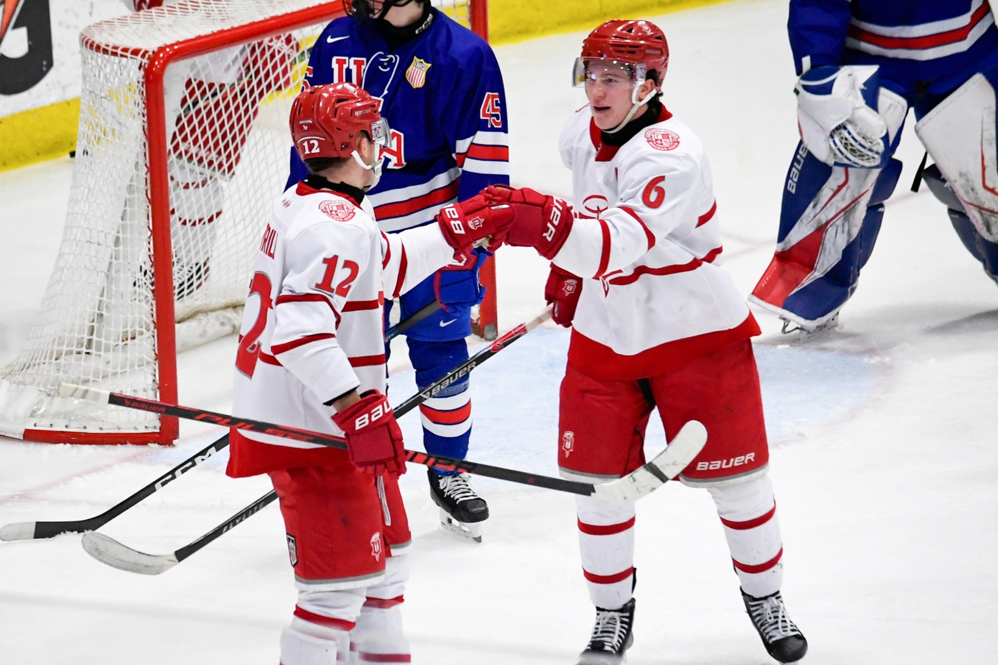 Arend and Merrill celebrate goal in February against USA