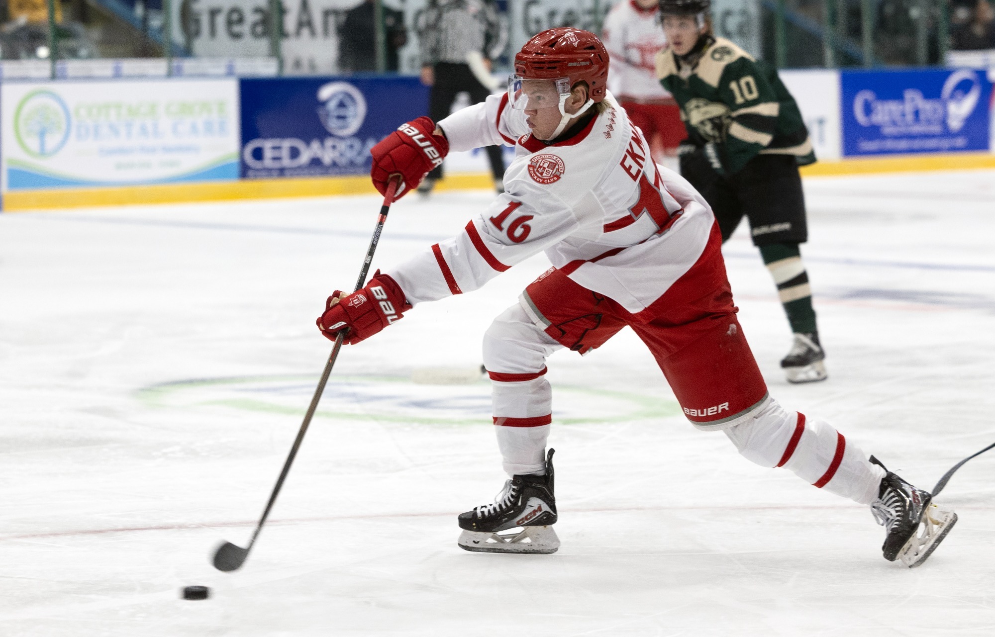 Melvin Ekman shoots puck against Cedar Rapids on Sept. 26