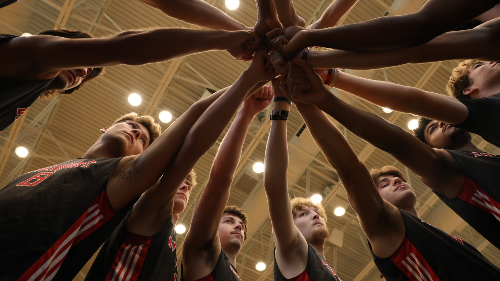 Men's volleyball huddle