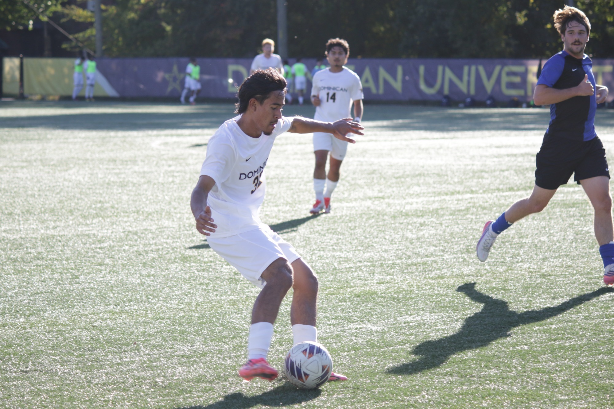 Raygoza crossing the ball into the box 