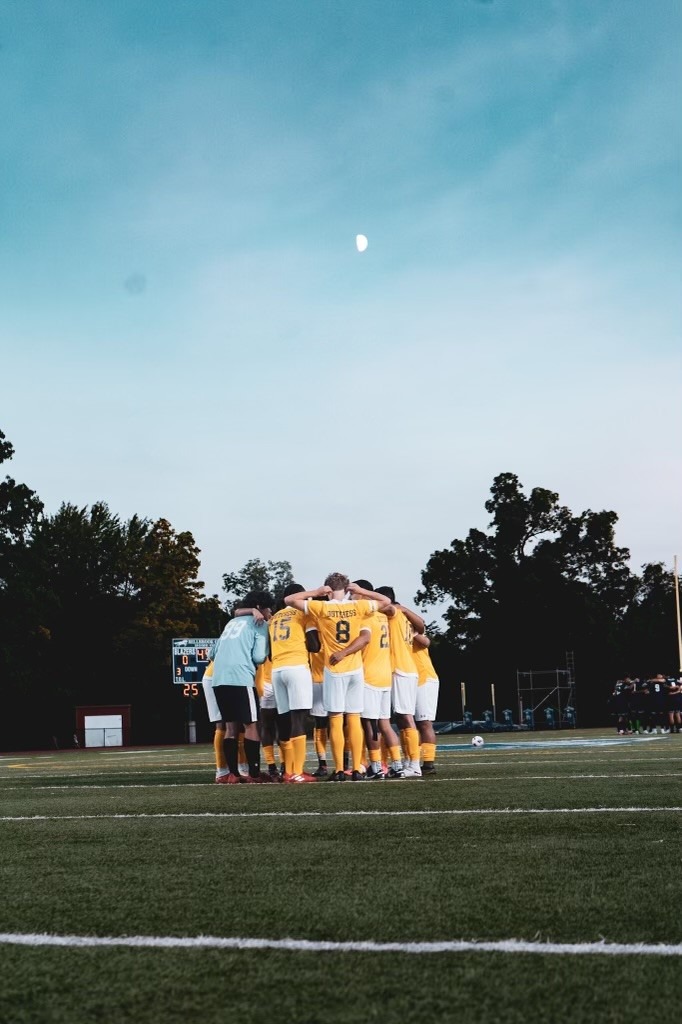 M Soccer Team Huddle