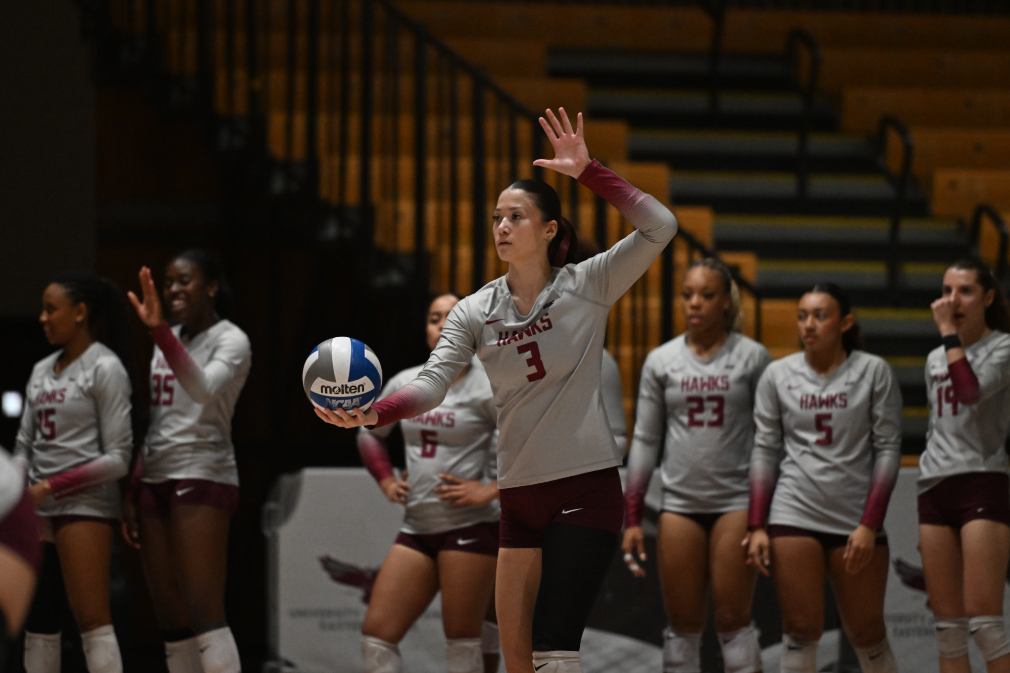 Kate-Linh Eden readies to serve vs Morgan State