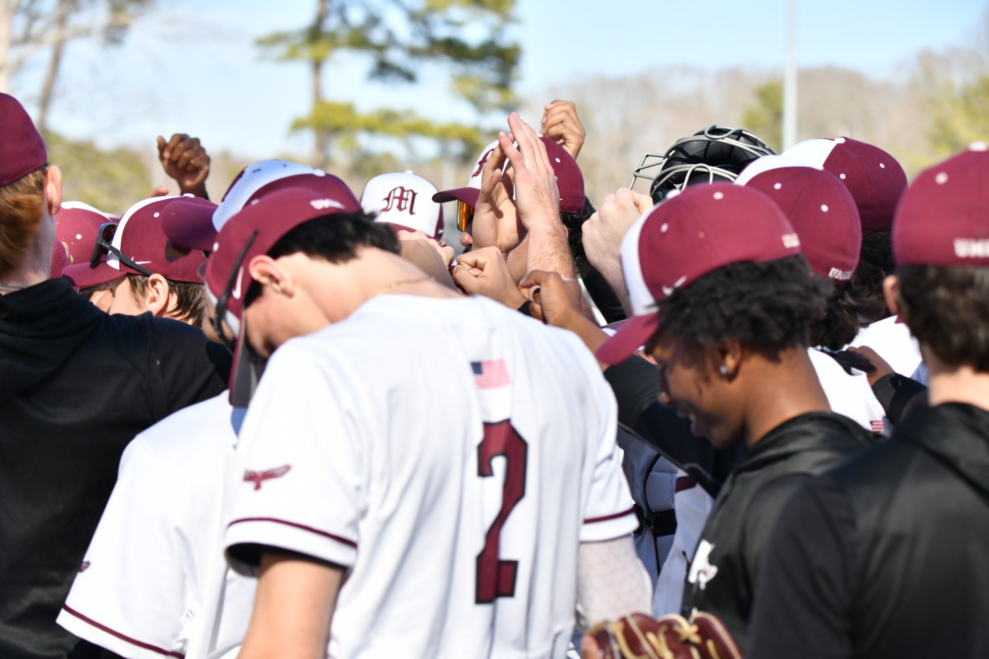 Baseball team huddle