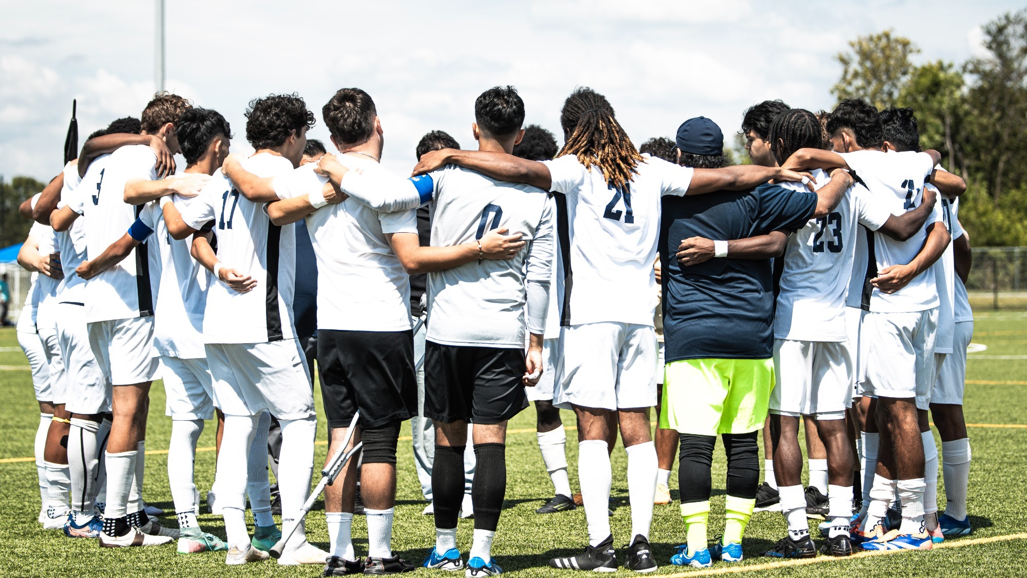 Soccer Team Huddle