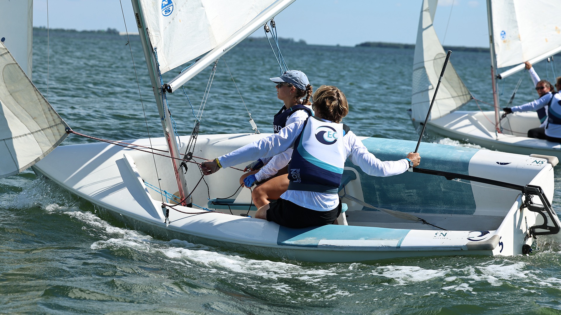 Female and male sailor on a boat 