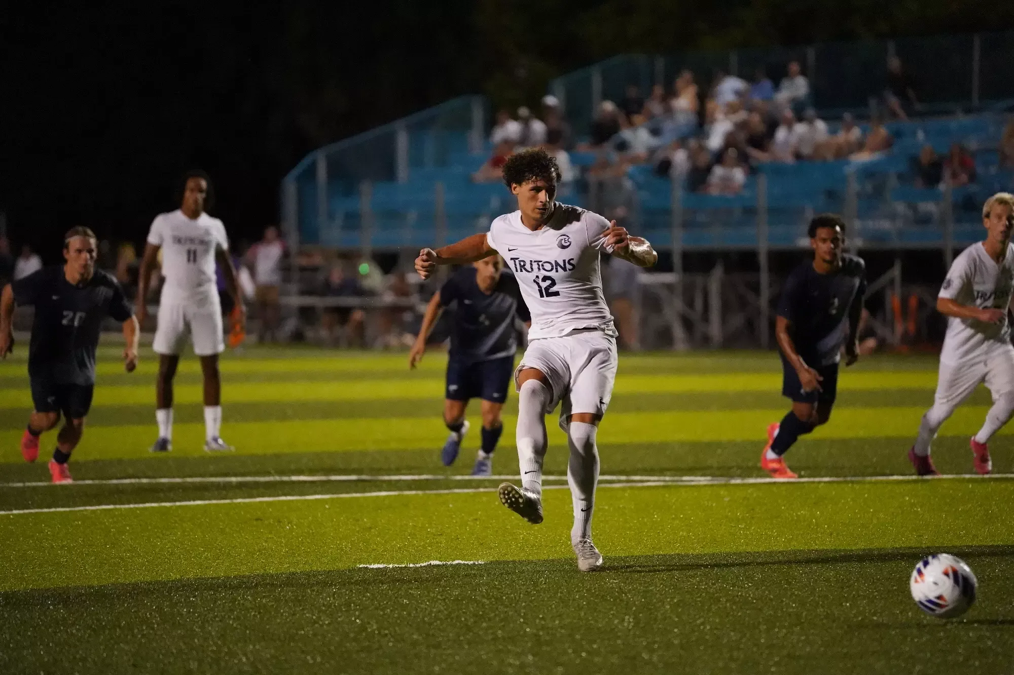 Eckerd player sends ball upfield