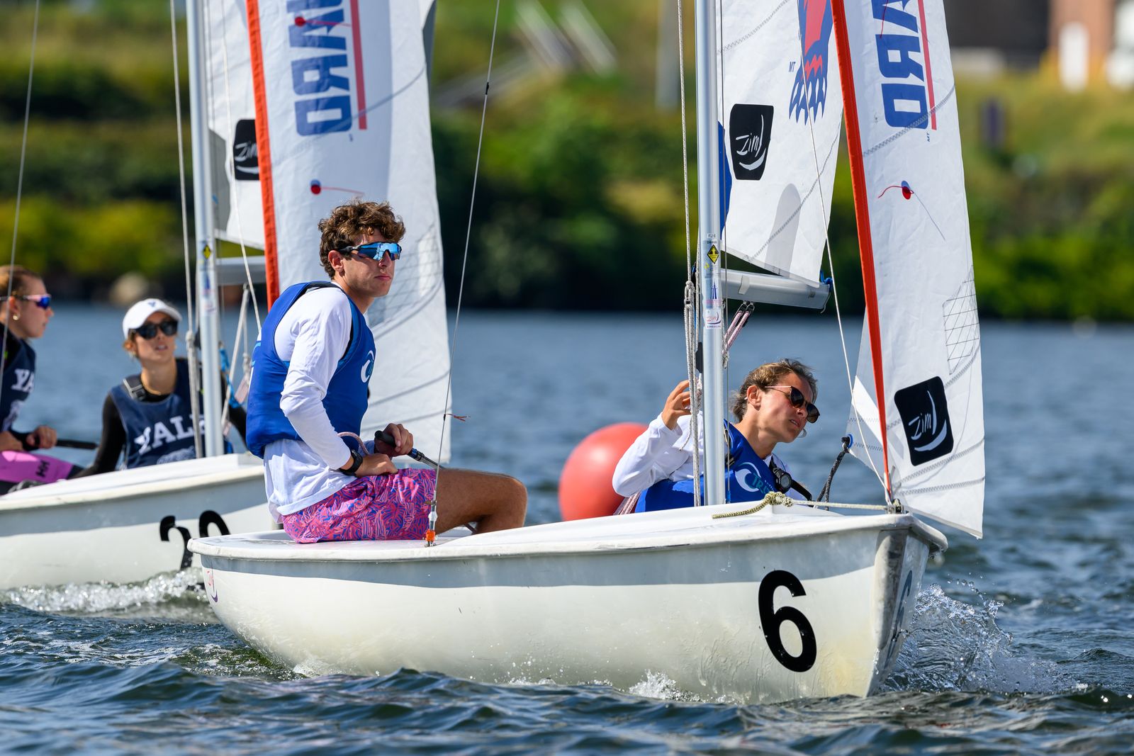 Two sailors looking out in front of them