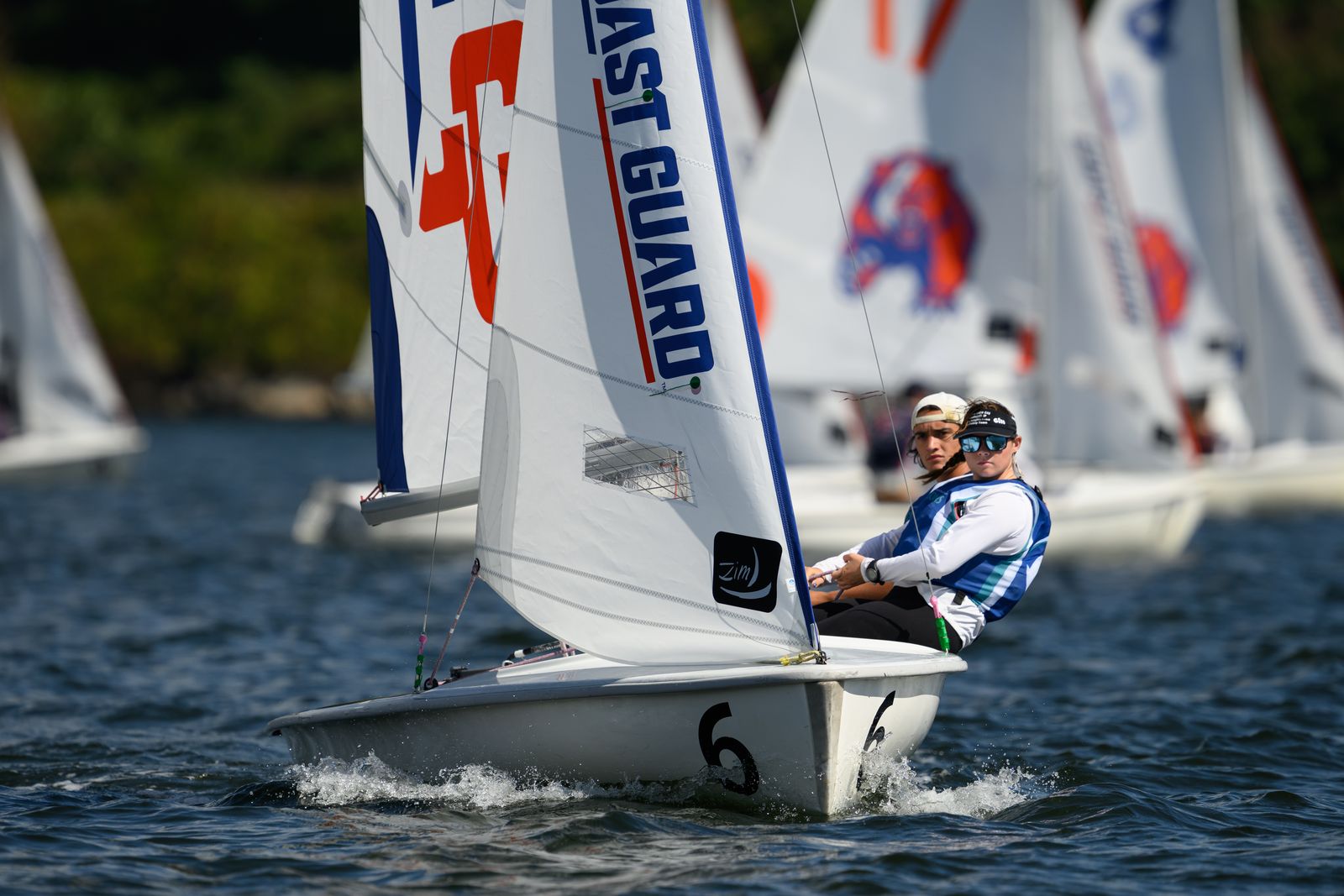 Eckerd sailors on same side of boat