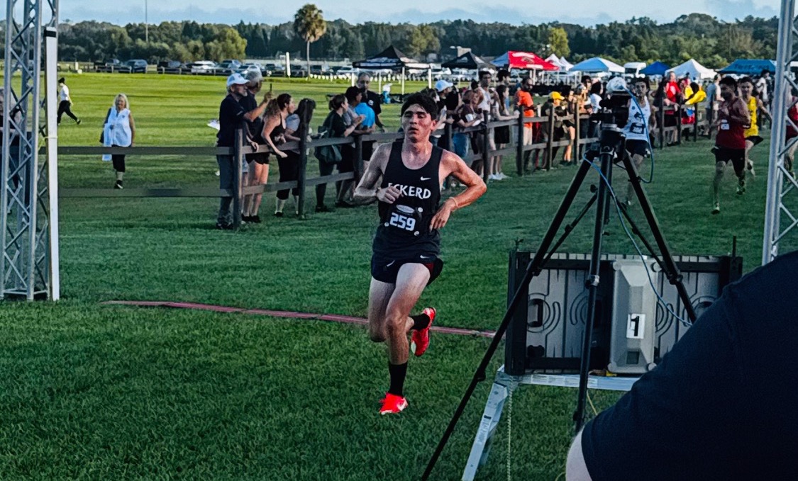 Cross country player crosses the finish line