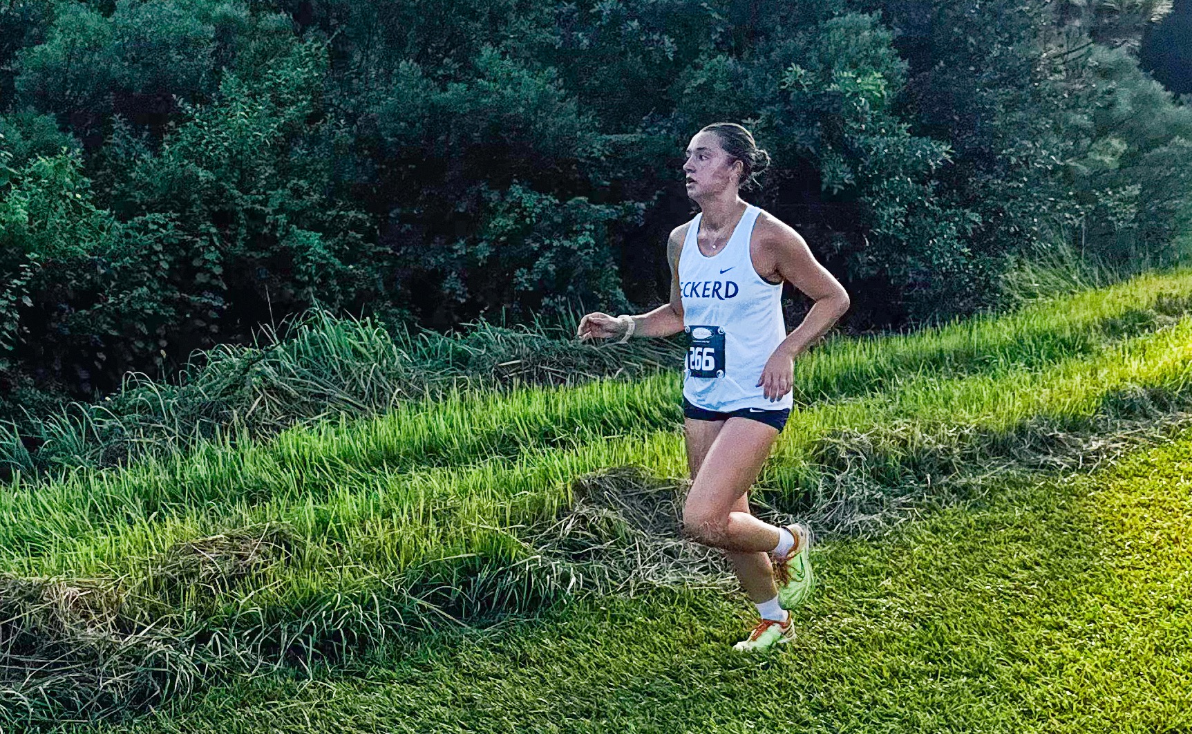 Women's runner running the course