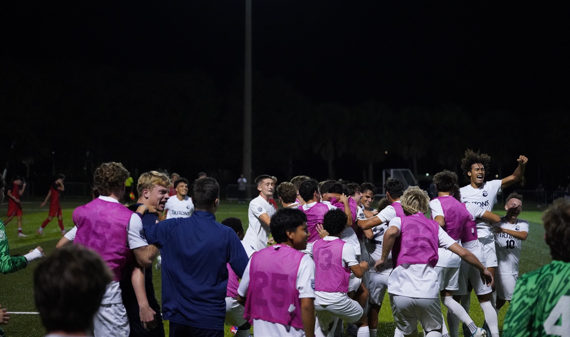 Players celebrate after a win