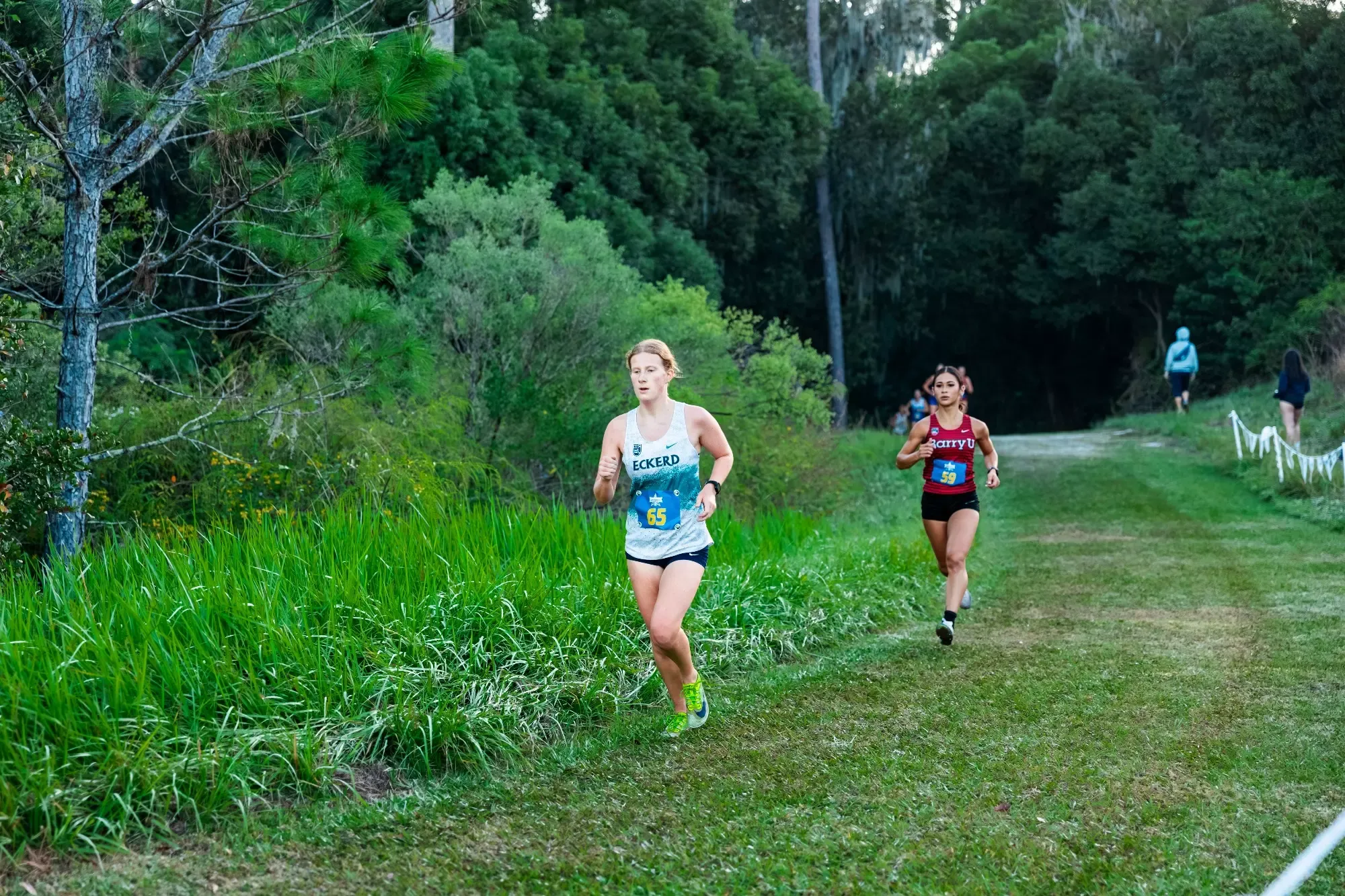 Eckerd runner ahead of opponent