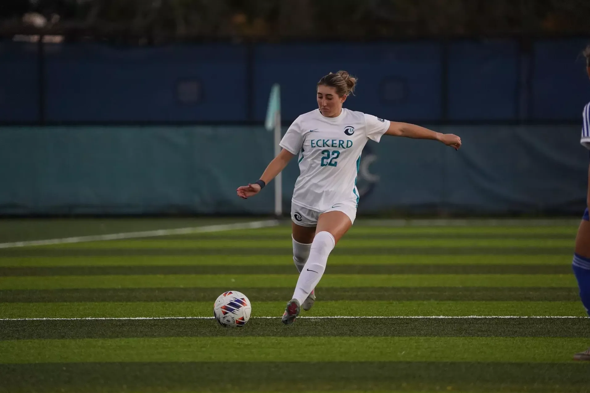 Player dribbles ball up field