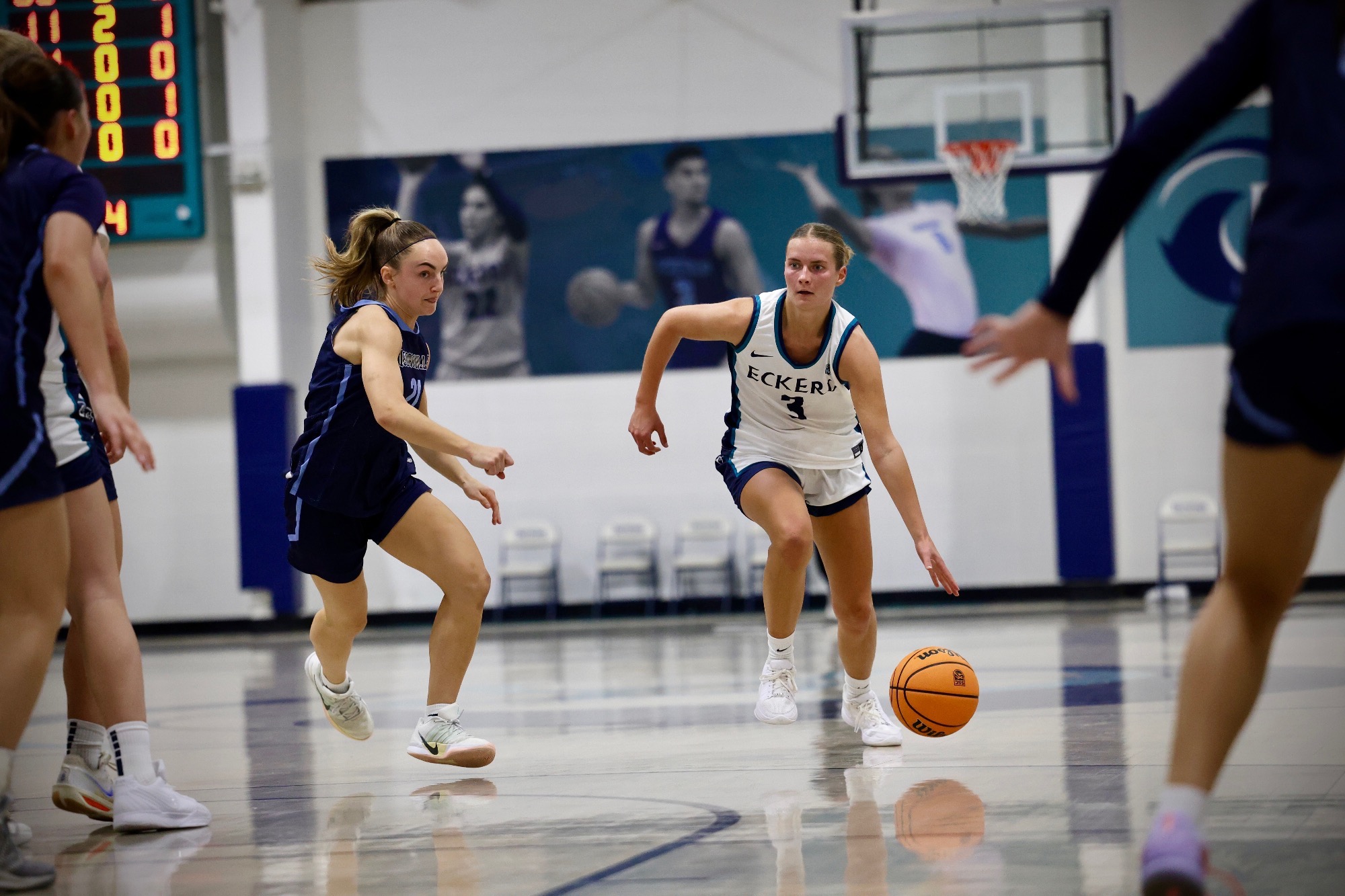Player driving past defender