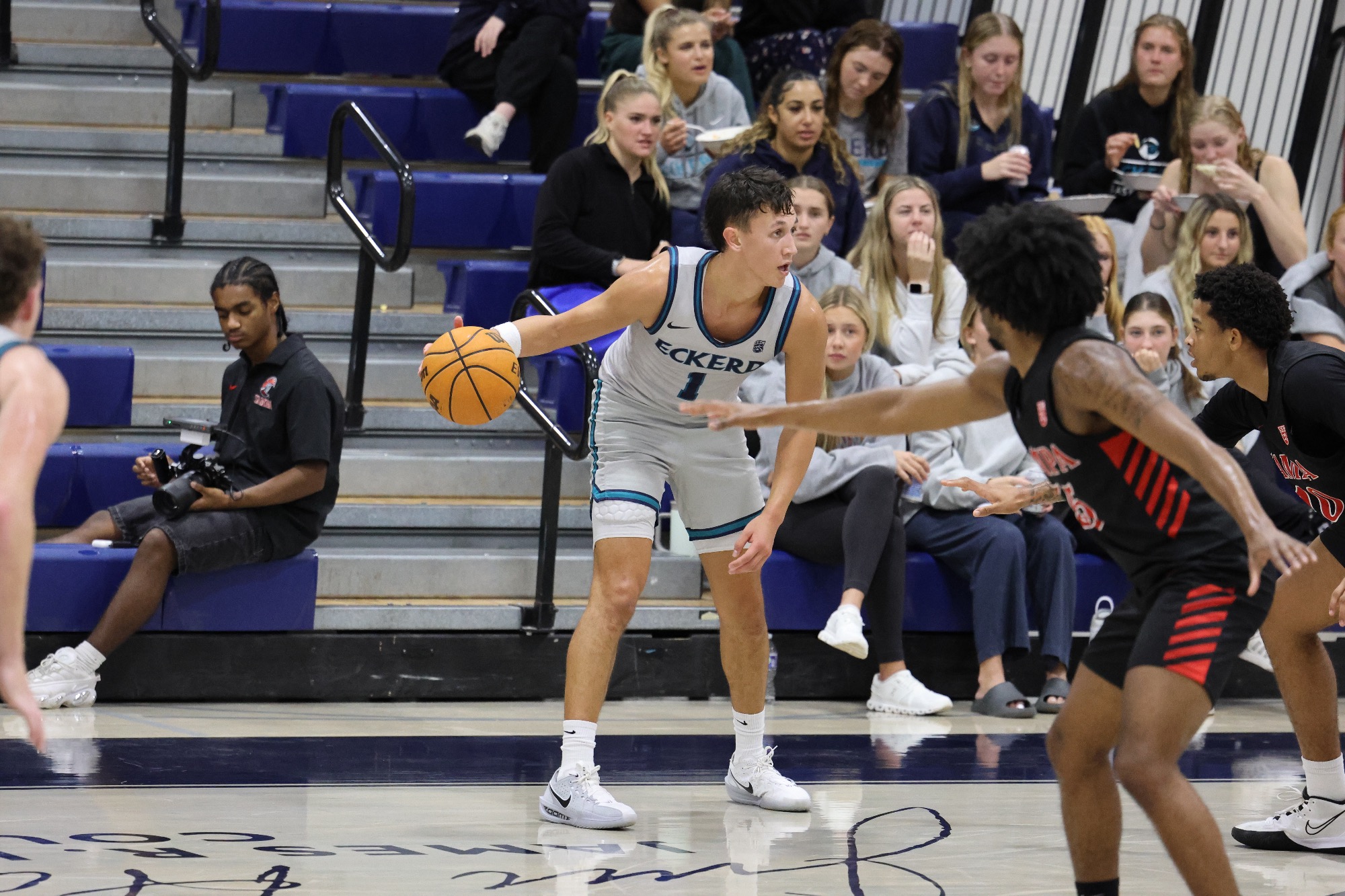 Player looks to drive ball past defender