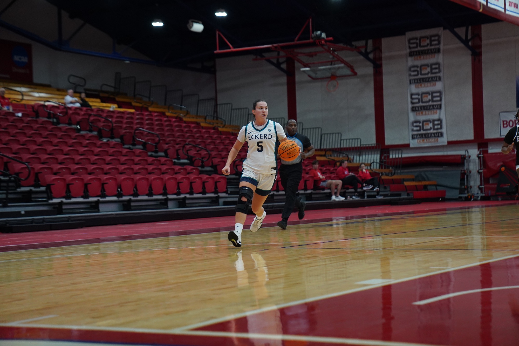 Player brings ball up floor