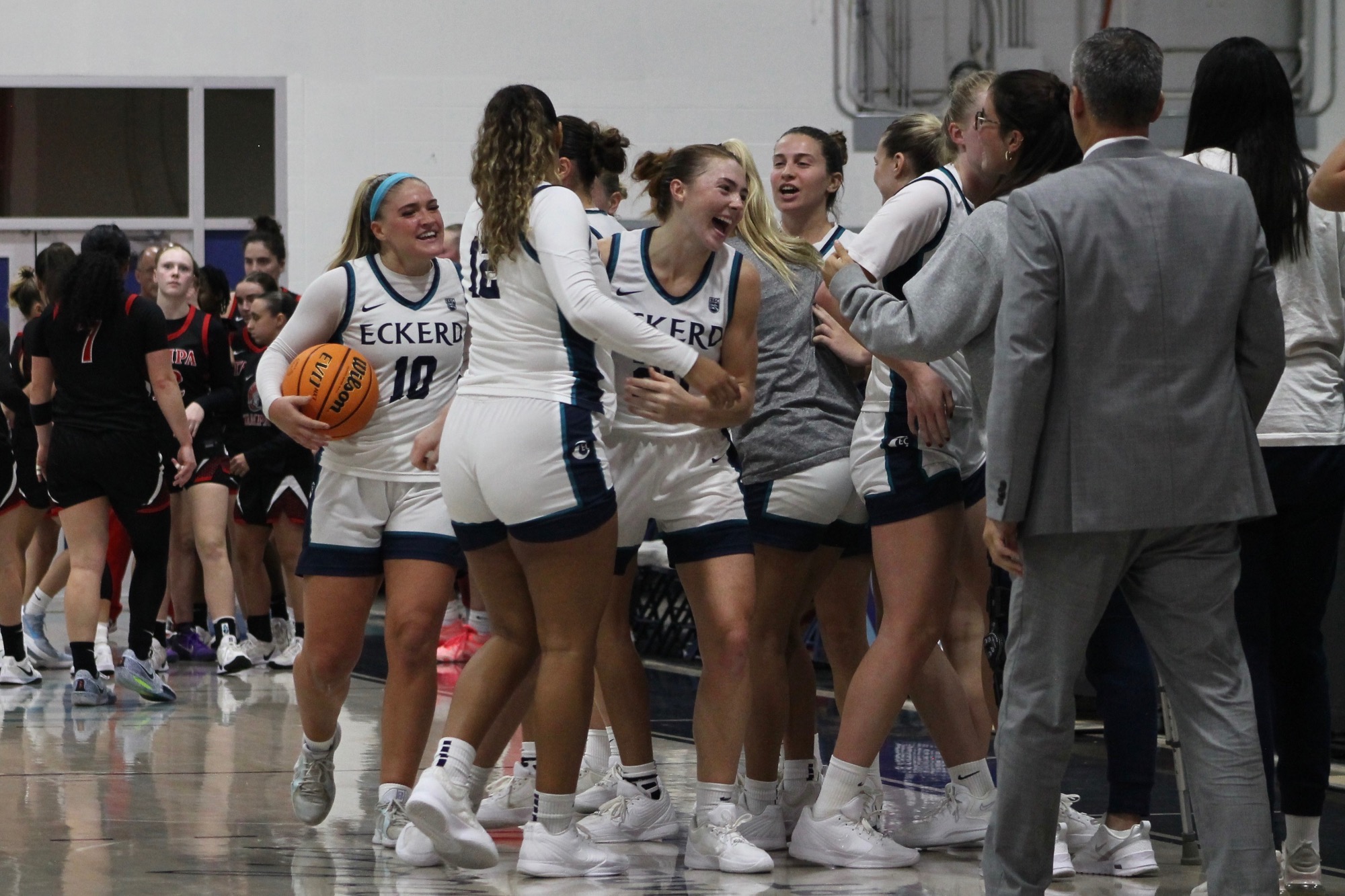 Players celebrate after win