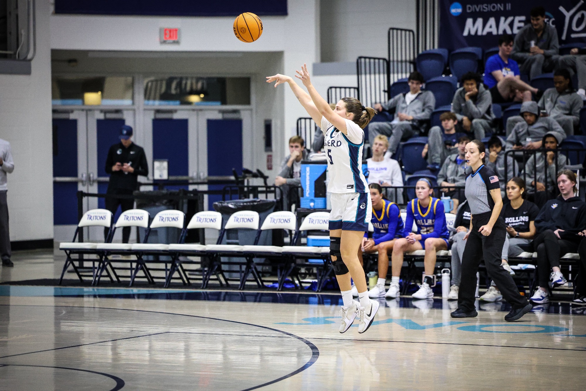 Player shooting three-pointer