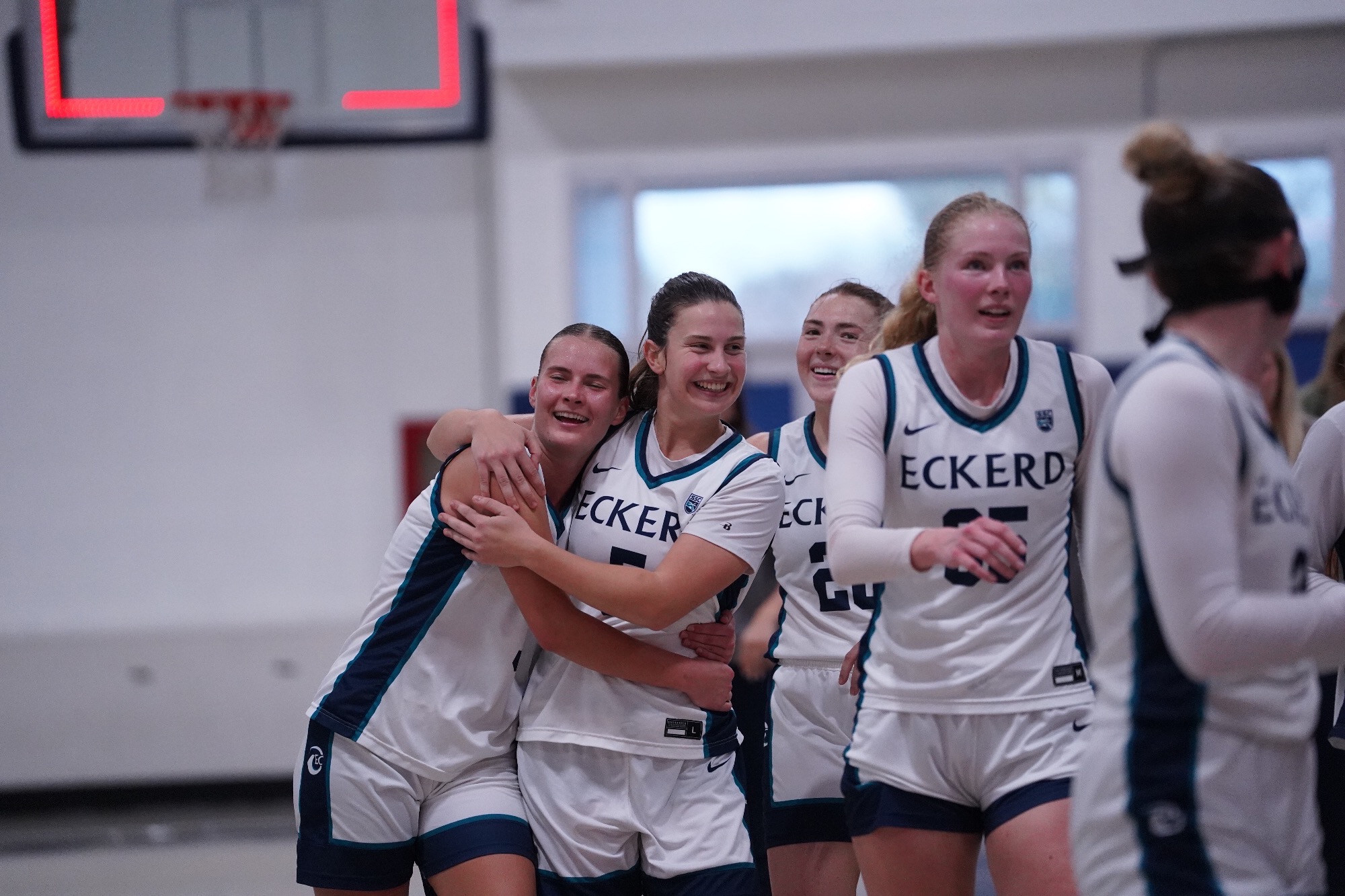 Players hug after win