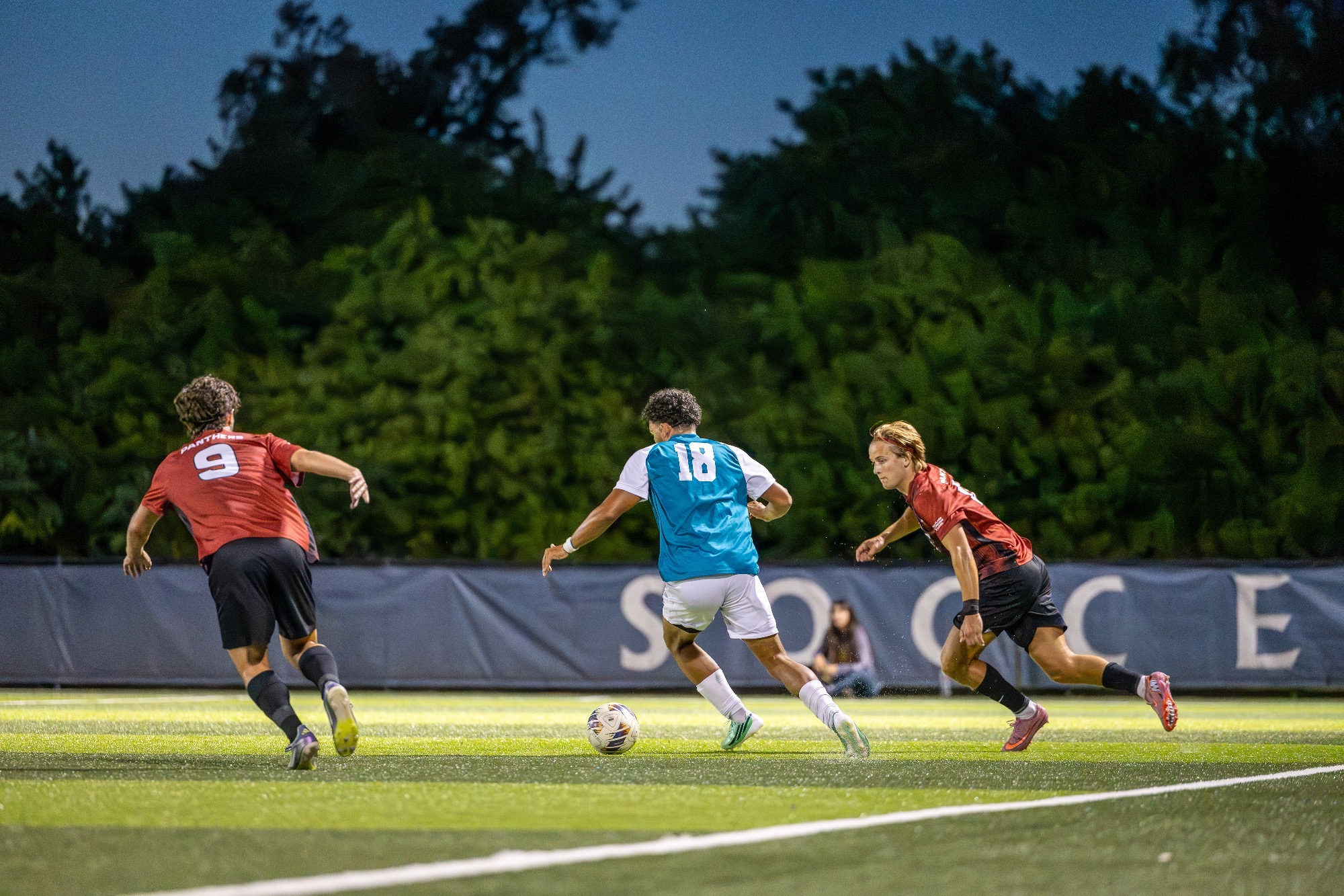 player splits two defenders