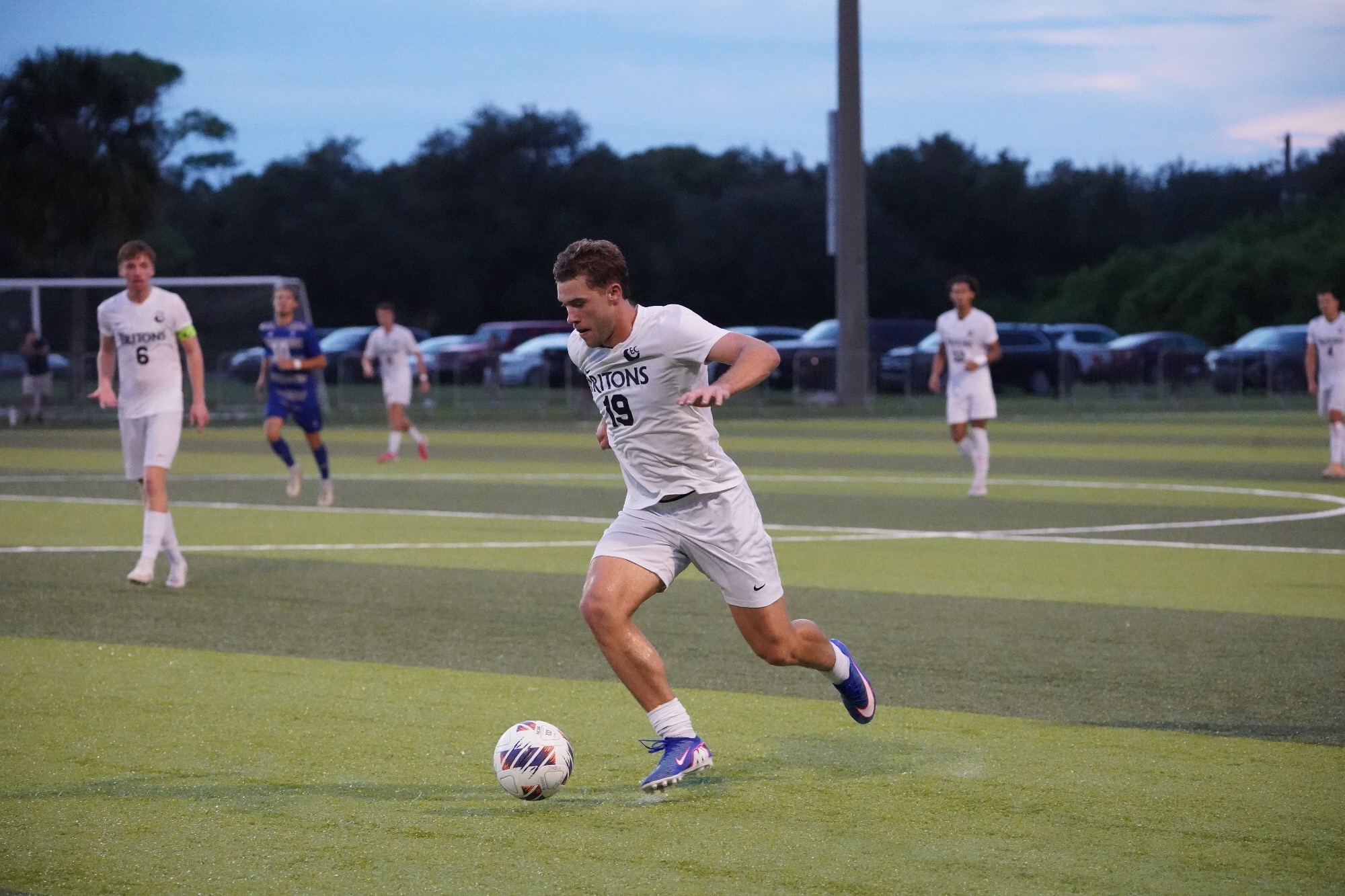 player running up field
