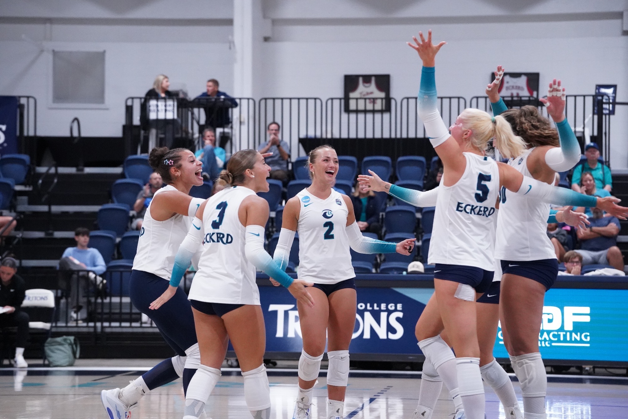 players celebrating after a point