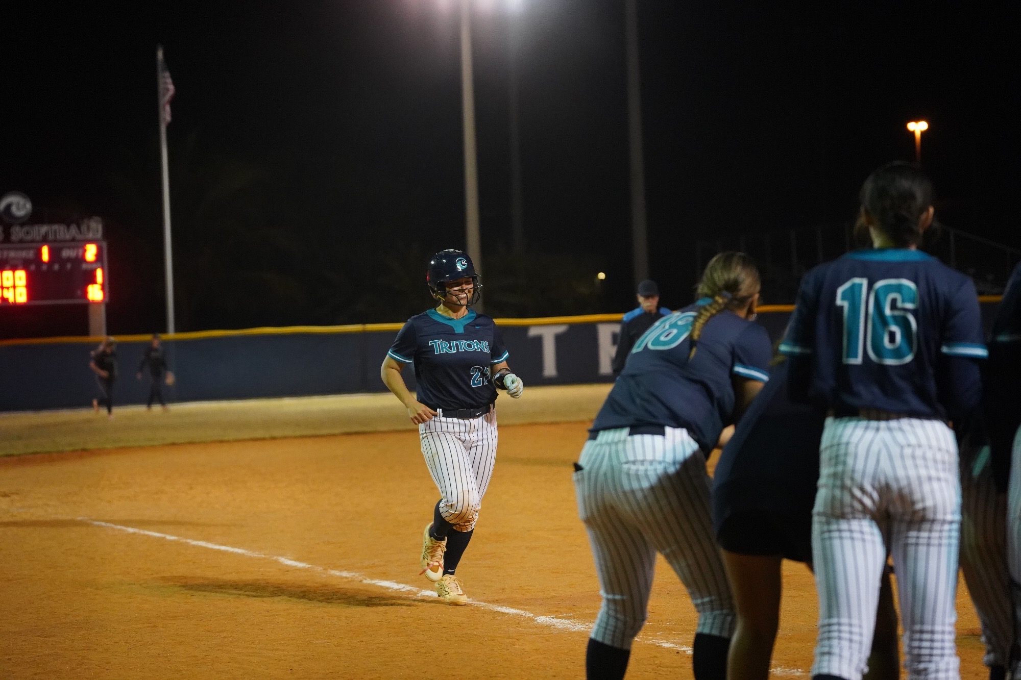 Player smiling after home run