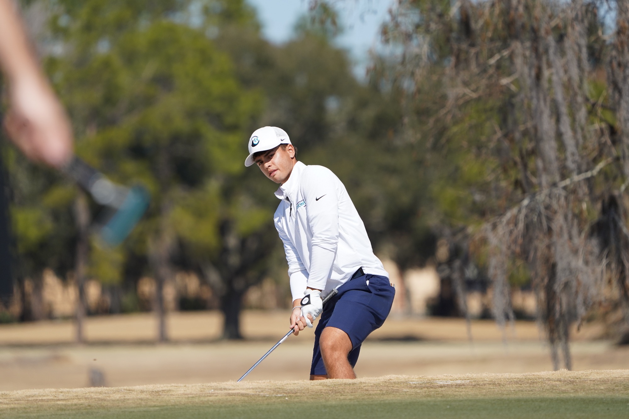 Player swings at ball